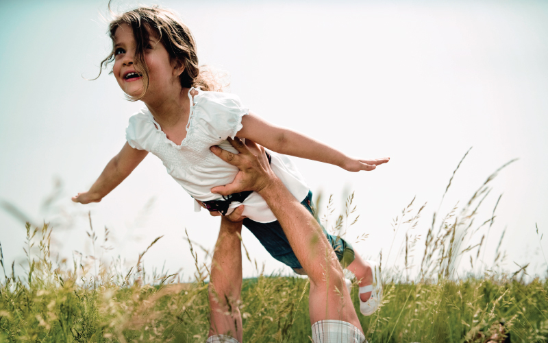 Inpro’s 2020 Balance Palette represents the world around us, this image shows a young girl in prairie field being lifted to act as an airplane as she balances on the man’s hands and incorporates light colors, neutrals, botanicals, and elements of glass and stone, wood and sky.
