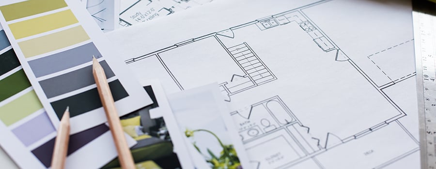 Room layout with color swatches and pencils. 
