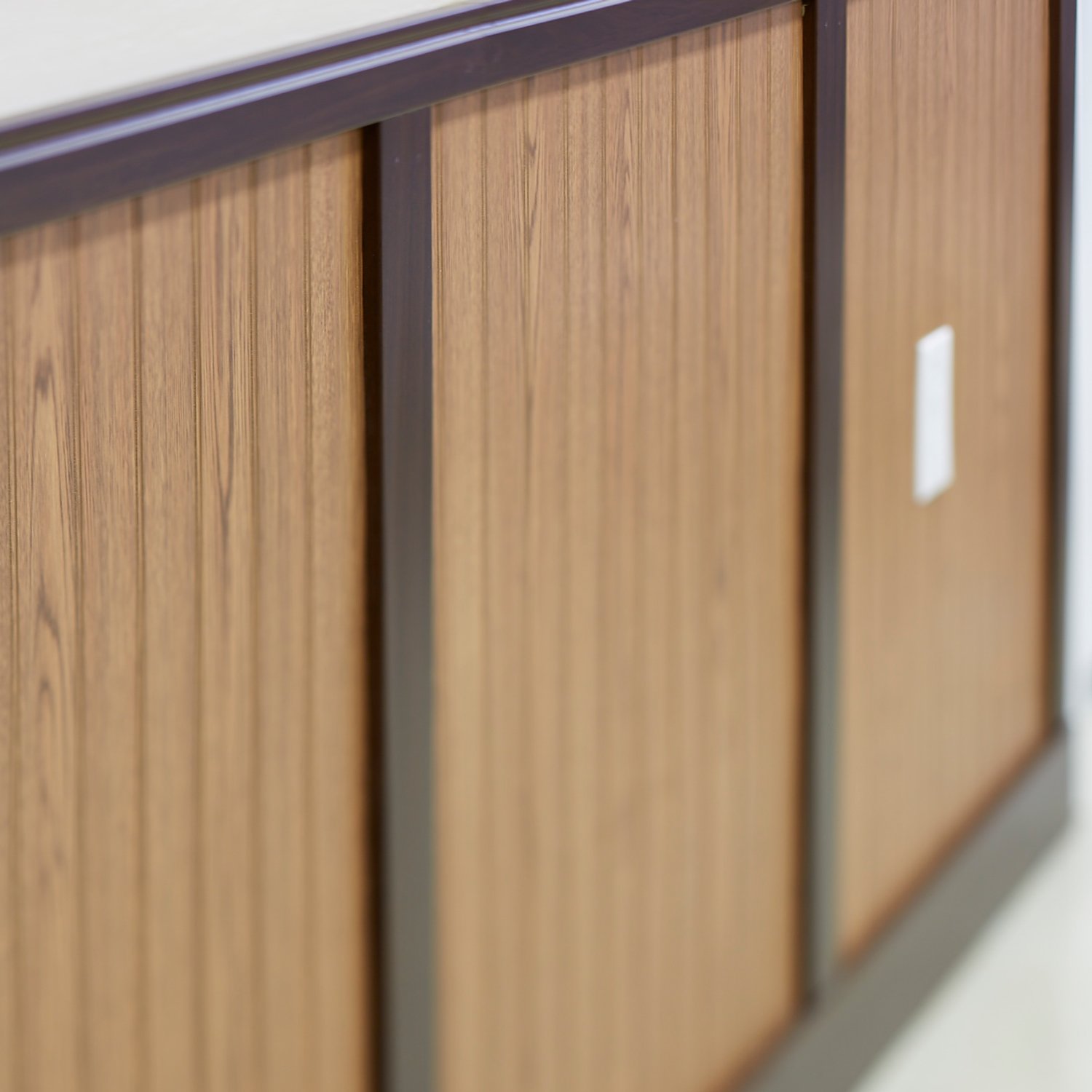 Close up image of light wood grain rigid vinyl