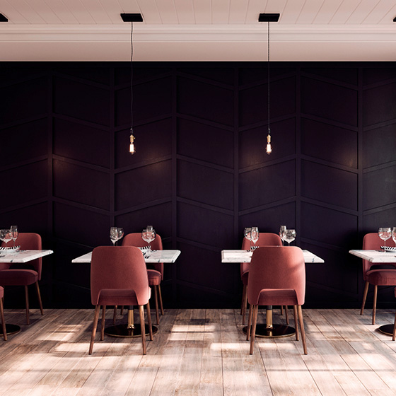 The back wall of a restaurant shows a raised chevron pattern using Palladium® 3D Trim